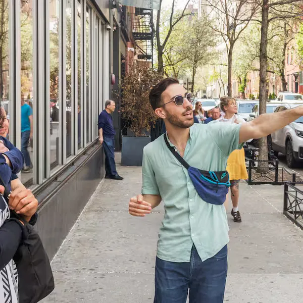 David leading an architecture walking tour on a New York City street