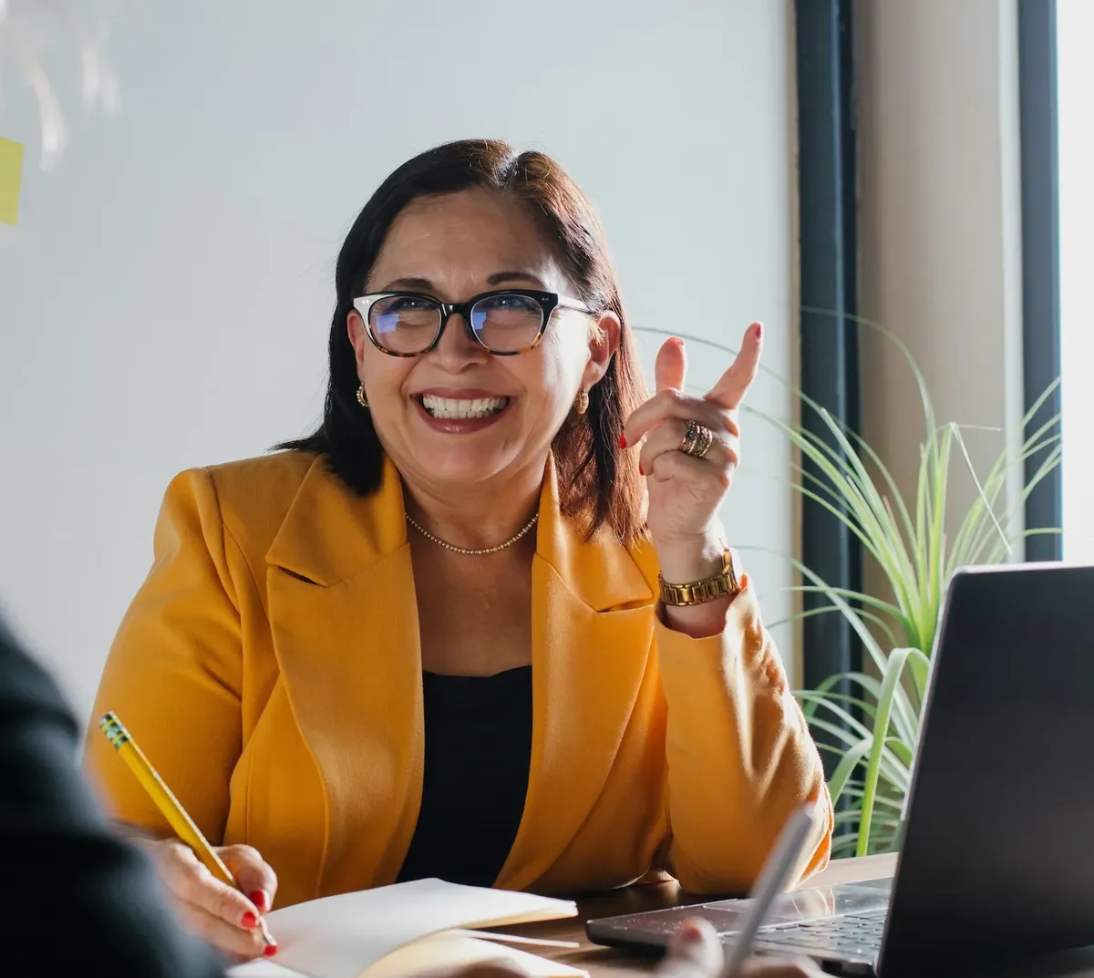 Maureen M., a Community Manager, in a meeting